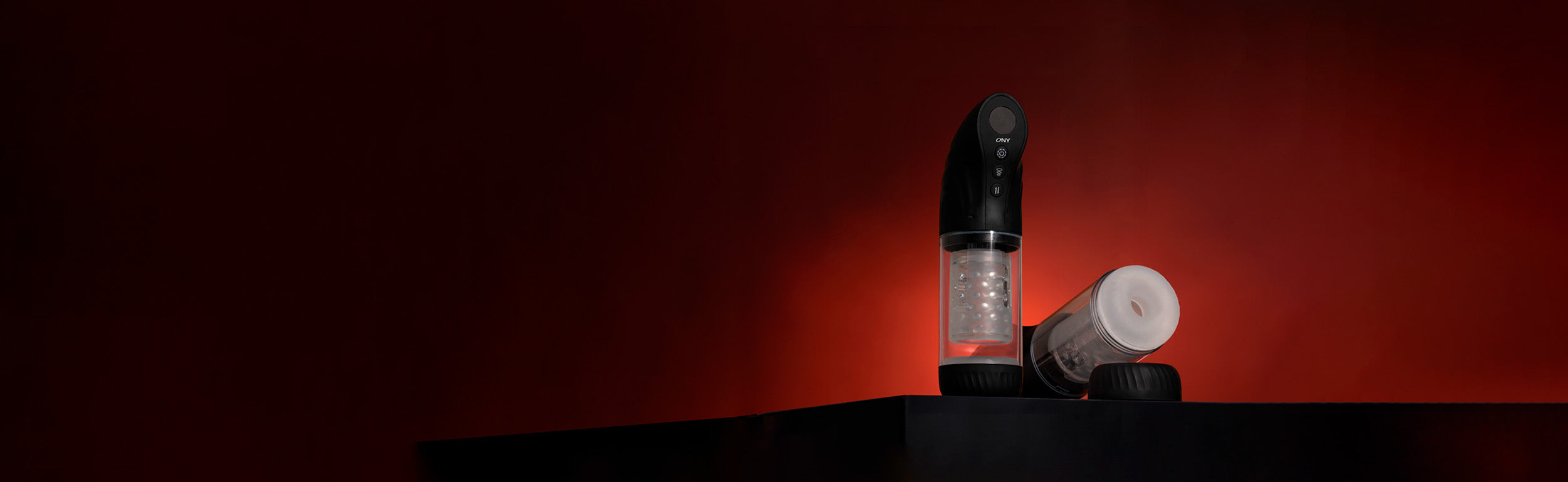 Bannière de l'Exa One, le masturbateur automatique d'ONY sur fond rouge et noir
